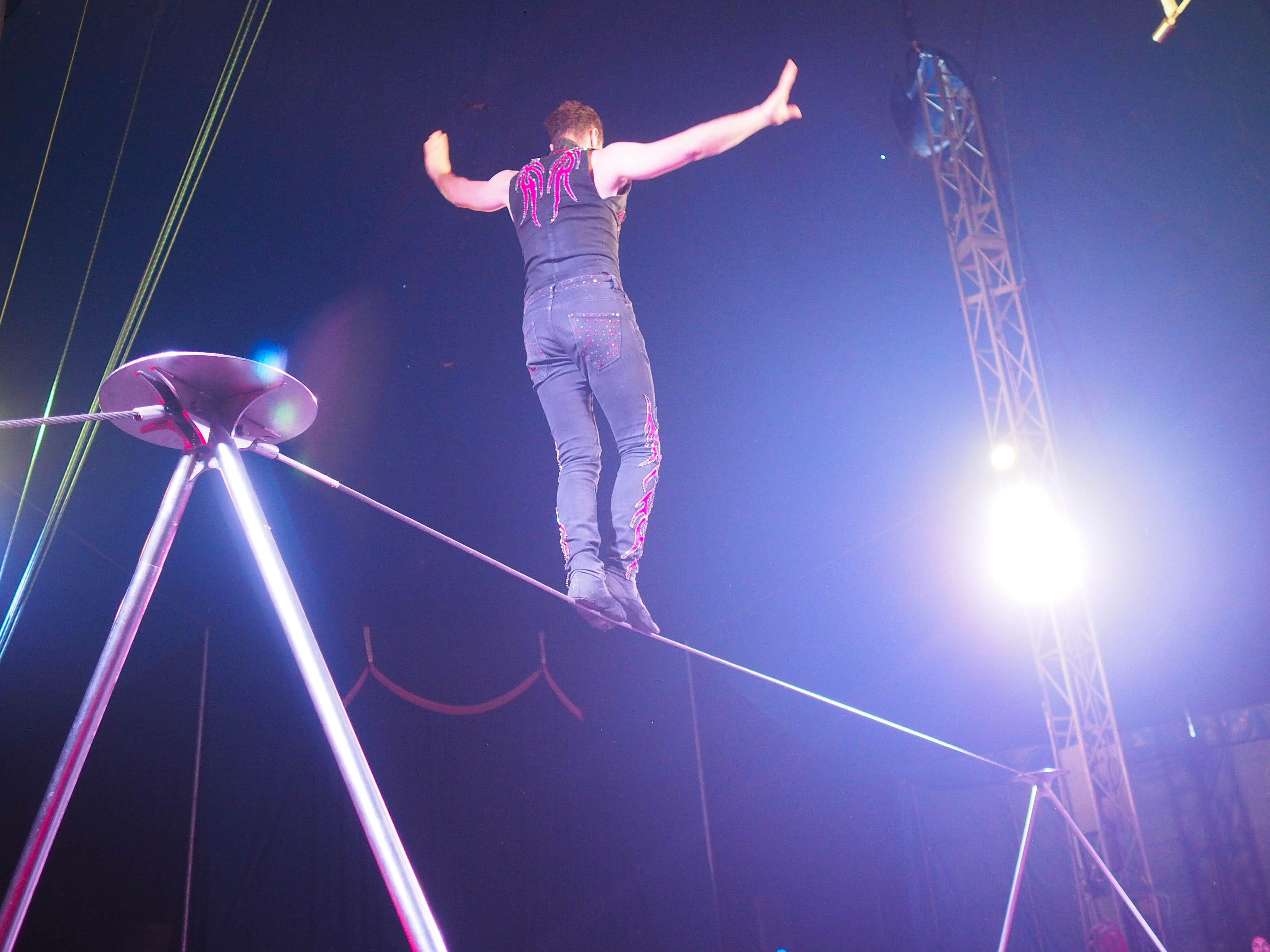 man walking on tightwire